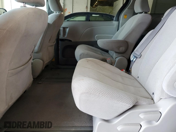 2011 Toyota Sienna LE AAS с VIN 5TDKK3DC3BS041604, выставлен на аукционе Copart как лот 59544695 с пробегом 265 521 миль миль и Списание • Salvage title. История ставок и продаж доступна на DreamBid. Изображение 11.