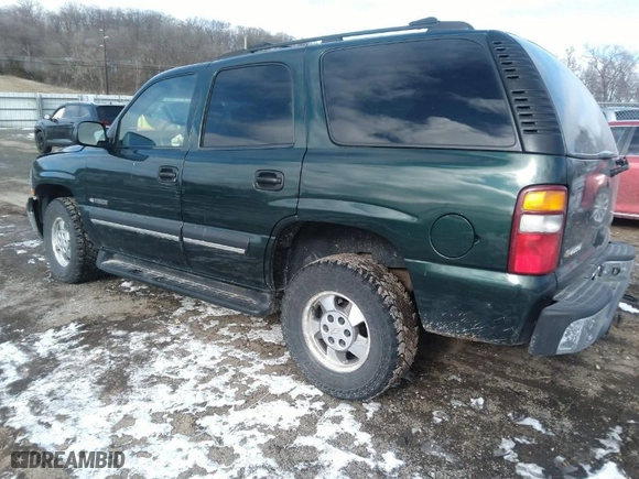 2003 Chevrolet Tahoe Special Service Veh with VIN 1GNEK13V33J215889, listed as a IAAI auction lot 41219639 with 157,570 mi miles. Bid and sale history available at carsss.com. Image 3.