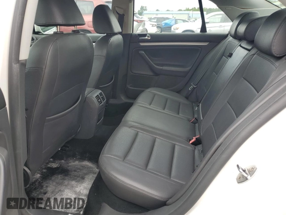 2009 Volkswagen Jetta SE z VIN 3VWRM71K39M057367, wystawiony jako Copart lot #58745235 z przebiegiem 130 647 mil mil oraz Szkoda całkowita • Salvage title. Historia ofert i sprzedaży dostępna na DreamBid. Obrazek 10.