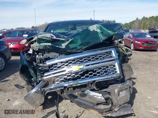 2015 Chevrolet Silverado 1500 LT with VIN 3GCUKRECXFG510895, listed as a IAAI auction lot 41616270 with 113,853 mi miles. Bid and sale history available at carsss.com. Image 13.