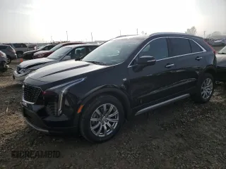 2021 Cadillac XT4 AWD Premium Luxury with VIN 1GYFZDR40MF080166, listed as a Copart auction lot 82883764 with 27,793 mi miles and Salvage Title. Bid and sale history available at carsss.com. Image 1.