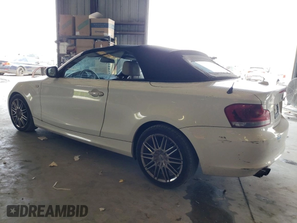 2012 BMW 1 Series 128i with VIN WBAUN1C5XCVH84372, listed as a Copart auction lot 54162815 with 127,420 mi miles and Clean title. Bid and sale history available at DreamBid. Image 2.