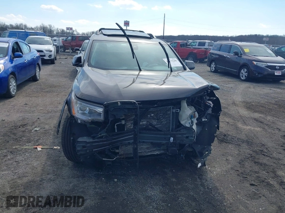 2019 GMC Acadia Denali with VIN 1GKKNXLSXKZ114736, listed as a IAAI auction lot 41679200 with 56,086 mi miles and . Bid and sale history available at carsss.com. Image 11.