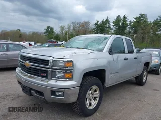 2014 Chevrolet Silverado 1500 LT with VIN 1GCVKREC8EZ151534, listed as a IAAI auction lot 42221023 with 216,835 mi miles and . Bid and sale history available at DreamBid. Image 2.