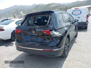 2022 Volkswagen Tiguan S z VIN 3VV1B7AX5NM056766, wystawiony jako IAAI lot #42024519 z przebiegiem 97 548 mil mil oraz . Historia ofert i sprzedaży dostępna na DreamBid. Obrazek 4.