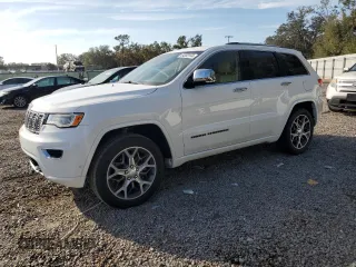 2019 Jeep Grand Cherokee Overland with VIN 1C4RJFCT2KC834690, listed as a Copart auction lot 84303144 with 63,053 mi miles and Salvage Title. Bid and sale history available at carsss.com. Image 1.