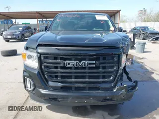 2022 GMC Canyon 2WD Elevation with VIN 1GTG5CEN5N1151794, listed as a IAAI auction lot 41876656 with 57,305 mi miles. Bid and sale history available at carsss.com. Image 13.