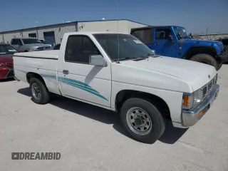 1995 Nissan Frontier with VIN 1N6SD11S1SC325337, listed as a Copart auction lot 49730305 with 102,286 mi miles and Clean title. Bid and sale history available at DreamBid. Image 4.