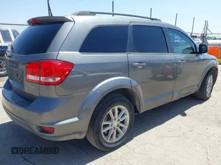 2013 Dodge Journey SXT with VIN 3C4PDCBB4DT563709, listed as a IAAI auction lot 42019033 with 201,188 mi miles. Bid and sale history available at carsss.com. Image 4.