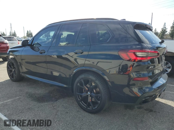 2021 BMW X5 xDrive45e with VIN 5UXTA6C03M9H56515, listed as a Copart auction lot 45798715 with 59,156 mi miles and Salvage Title. Bid and sale history available at carsss.com. Image 2.