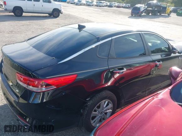 2016 Kia Optima LX with VIN 5XXGT4L31GG022844, listed as a IAAI auction lot 41240100 with 121,586 mi miles and . Bid and sale history available at DreamBid. Image 4.