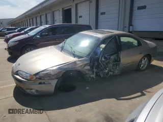 2002 Oldsmobile Aurora z VIN 1G3GR64H424238288, wystawiony jako Copart lot #68086014 z przebiegiem 97 232 mil mil oraz Szkody całkowita. Historia ofert i sprzedaży dostępna na DreamBid. Obrazek 1.