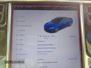 2014 Tesla Model S 60 z VIN 5YJSA1H15EFP48938, wystawiony jako IAAI lot #41574976 z przebiegiem 230 246 mil mil oraz . Historia ofert i sprzedaży dostępna na DreamBid. Obrazek 7.
