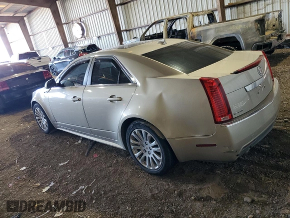 2013 Cadillac CTS Performance with VIN 1G6DK5E30D0157791, listed as a Copart auction lot 83798544 with 124,638 mi miles and Salvage Title. Bid and sale history available at DreamBid. Image 2.