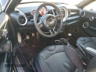 2012 MINI Roadster S z VIN WMWSY3C51CT565240, wystawiony jako Copart lot #83651954 z przebiegiem 172 954 mil mil oraz Szkody całkowita. Historia ofert i sprzedaży dostępna na DreamBid. Obrazek 8.