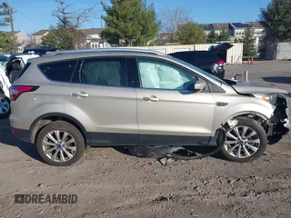 2017 Ford Escape Titanium with VIN 1FMCU0JD2HUD92675, listed as a IAAI auction lot 41834723 with 113,503 mi miles. Bid and sale history available at carsss.com. Image 13.