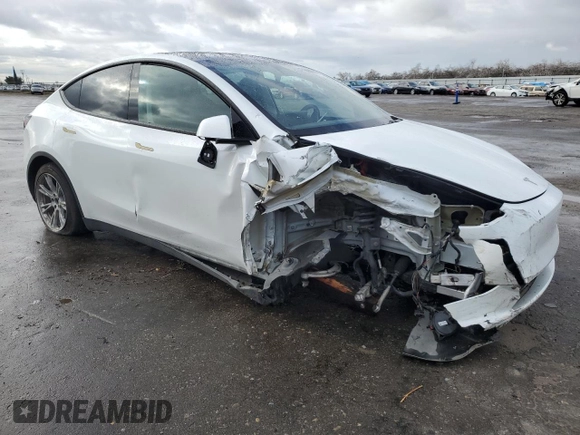 2023 Tesla Model Y Long Range z VIN 7SAYGAEE5PF743079, wystawiony jako Copart lot #45570655 z przebiegiem 46 145 mil mil oraz Szkoda całkowita • Salvage title. Historia ofert i sprzedaży dostępna na DreamBid. Obrazek 4.