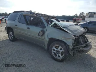 2004 GMC Envoy XL SLE with VIN 1GKET16S346115131, listed as a Copart auction lot 82677024 with 290,656 mi miles and Salvage Title. Bid and sale history available at carsss.com. Image 4.