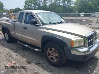 2005 Dodge Dakota SLT with VIN 1D7HW42N45S110567, listed as a IAAI auction lot 42569653 with 113,342 mi miles and . Bid and sale history available at DreamBid. Image 1.
