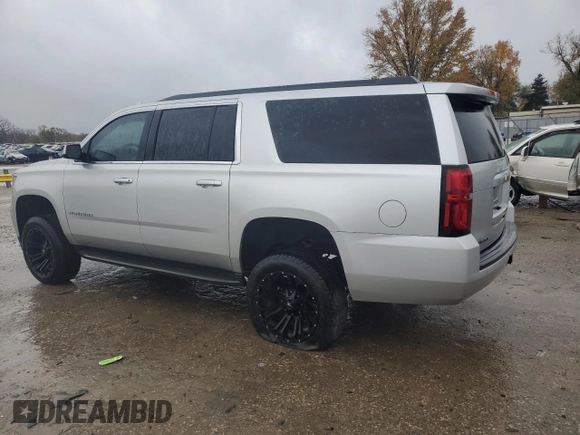 2016 Chevrolet Suburban LT with VIN 1GNSKHKC1GR257416, listed as a Copart auction lot 80993814 with 142,470 mi miles and Salvage Title. Bid and sale history available at DreamBid. Image 2.