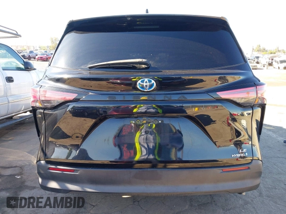 2021 Toyota Sienna LE with VIN 5TDKRKEC5MS043913, listed as a IAAI auction lot 40141863 with 89,439 mi miles. Bid and sale history available at carsss.com. Image 16.