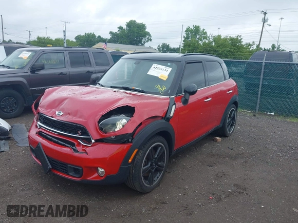 2015 MINI Countryman S with VIN WMWZC3C57FWT04338, listed as a IAAI auction lot 42524134 with 52,137 mi miles and . Bid and sale history available at DreamBid. Image 17.