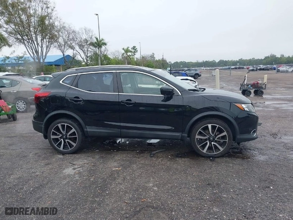 2017 Nissan Rogue Sport SL with VIN JN1BJ1CR5HW140854, listed as a IAAI auction lot 41409419 with 59,144 mi miles. Bid and sale history available at carsss.com. Image 13.