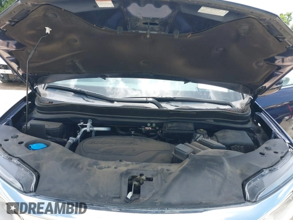 2022 Honda Pilot Touring 7-Passenger with VIN 5FNYF5H61NB019768, listed as a IAAI auction lot 42438780 with Not provided miles and . Bid and sale history available at DreamBid. Image 10.