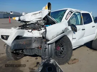 2012 Toyota Tacoma PreRunner z VIN 3TMJU4GN2CM128050, wystawiony jako IAAI lot #42200352 z przebiegiem Nie podano mil oraz . Historia ofert i sprzedaży dostępna na DreamBid. Obrazek 6.