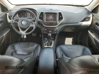 2018 Jeep Cherokee Limited с VIN 1C4PJMDB2JD574818, выставлен на аукционе Copart как лот 63497165 с пробегом 117 659 миль миль и Списание • Salvage title. История ставок и продаж доступна на DreamBid. Изображение 8.