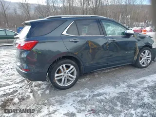 2018 Chevrolet Equinox Premier with VIN 3GNAXNEX0JS614356, listed as a IAAI auction lot 41624067 with 128,650 mi miles. Bid and sale history available at carsss.com. Image 4.