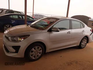 2023 Kia Rio LX z VIN 3KPA24AD8PE599304, wystawiony jako IAAI lot #41936054 z przebiegiem 16 261 mil mil oraz . Historia ofert i sprzedaży dostępna na DreamBid. Obrazek 14.