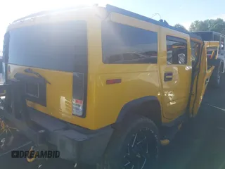 2004 Hummer H2 z VIN 5GRGN23UX4H118685, wystawiony jako IAAI lot #41790000 z przebiegiem Nie podano mil oraz . Historia ofert i sprzedaży dostępna na DreamBid. Obrazek 4.