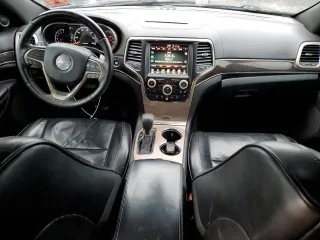 2017 Jeep Grand Cherokee Overland with VIN 1C4RJFCGXHC927470, listed as a Copart auction lot 45132185 with 119,543 mi miles and Salvage Title. Bid and sale history available at carsss.com. Image 8.