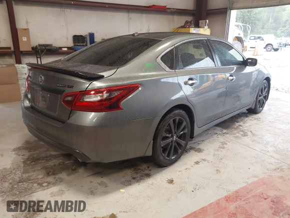 2018 Nissan Altima SR with VIN 1N4AL3AP1JC175694, listed as a IAAI auction lot 42006589 with 89,386 mi miles and . Bid and sale history available at carsss.com. Image 4.