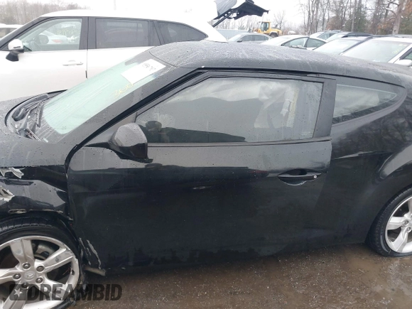 2012 Hyundai Veloster w/Black Int with VIN KMHTC6ADXCU024923, listed as a IAAI auction lot 41556793 with 101,923 mi miles and . Bid and sale history available at DreamBid. Image 14.