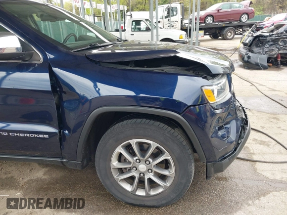 2014 Jeep Grand Cherokee Limited with VIN 1C4RJFBG4EC347208, listed as a IAAI auction lot 41982209 with 124,663 mi miles and . Bid and sale history available at DreamBid. Image 17.