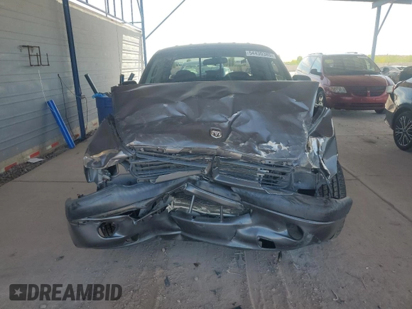 2001 Dodge Dakota Sport z VIN 1B7HL2AN21S298590, wystawiony jako Copart lot #54430385 z przebiegiem 175 365 mil mil oraz Szkoda całkowita • Salvage title. Historia ofert i sprzedaży dostępna na DreamBid. Obrazek 5.