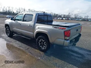 2016 Toyota Tacoma SR with VIN 3TMCZ5AN9GM001620, listed as a IAAI auction lot 41902924 with 117,462 mi miles. Bid and sale history available at carsss.com. Image 3.