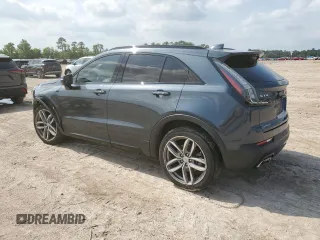 2020 Cadillac XT4 FWD Sport with VIN 1GYFZER40LF012664, listed as a Copart auction lot 54797915 with 59,393 mi miles and Salvage title. Bid and sale history available at DreamBid. Image 2.