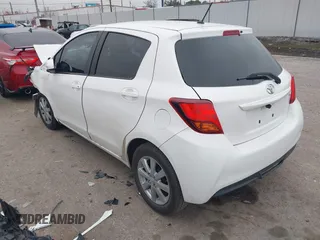 2015 Toyota Yaris L with VIN VNKKTUD34FA019480, listed as a IAAI auction lot 41341253 with 118,673 mi miles. Bid and sale history available at carsss.com. Image 3.