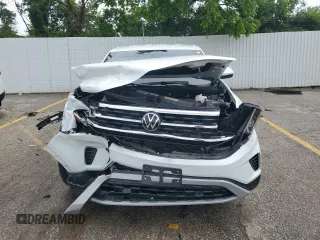 2023 Volkswagen Atlas SE z VIN 1V2HE2CA5PC204949, wystawiony jako Copart lot #59323505 z przebiegiem 17 689 mil mil oraz Szkoda całkowita • Salvage title. Historia ofert i sprzedaży dostępna na DreamBid. Obrazek 5.