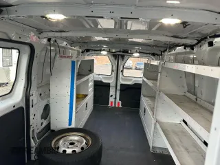 2015 Ford Transit with VIN 1FTNE2YM1FKA42474, listed as a Copart auction lot 51358645 with 252,999 mi miles and Clean Title. Bid and sale history available at DreamBid. Image 6.