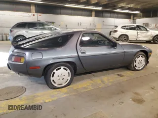 1984 Porsche 928 z VIN WP0JB0925ES861303, wystawiony jako Copart lot #41979575 z przebiegiem 114 593 mil mil oraz Nie do naprawy. Historia ofert i sprzedaży dostępna na DreamBid. Obrazek 3.