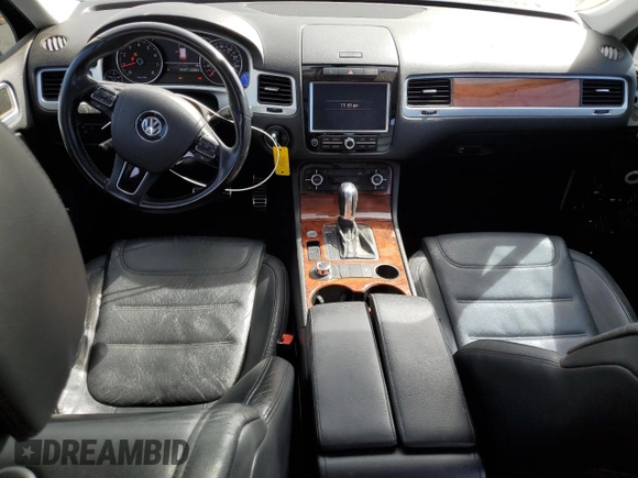 2012 Volkswagen Touareg с VIN WVGEG9BP1CD007581, выставлен на аукционе Copart как лот 47958355 с пробегом 79 649 миль миль и Списание • Salvage title. История ставок и продаж доступна на DreamBid. Изображение 8.