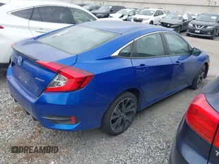 2021 Honda Civic Sport with VIN 2HGFC2F87MH554620, listed as a IAAI auction lot 41743596 with 52,327 mi miles and . Bid and sale history available at DreamBid. Image 4.