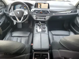 2019 BMW 7 Series 740i with VIN WBA7E2C52KB217153, listed as a Copart auction lot 65205835 with 61,981 mi miles and Clean title. Bid and sale history available at DreamBid. Image 8.