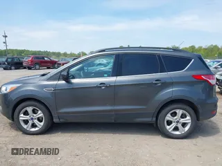 2016 Ford Escape SE with VIN 1FMCU9GX8GUB42944, listed as a IAAI auction lot 42171770 with 120,041 mi miles. Bid and sale history available at carsss.com. Image 14.