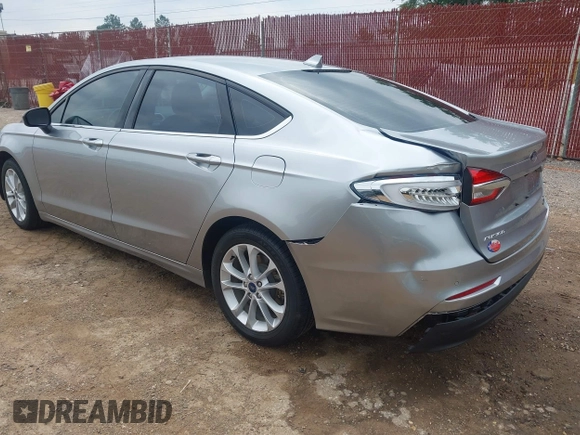 2020 Ford Fusion SE z VIN 3FA6P0LU4LR148070, wystawiony jako IAAI lot #42262446 z przebiegiem 69 057 mil mil oraz . Historia ofert i sprzedaży dostępna na DreamBid. Obrazek 6.