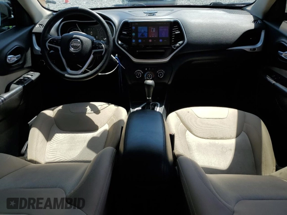2016 Jeep Cherokee Sport with VIN 1C4PJLAB3GW284244, listed as a Copart auction lot 54418995 with 121,095 mi miles and Salvage Title. Bid and sale history available at DreamBid. Image 8.